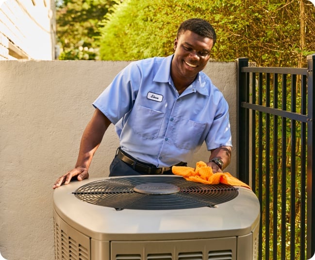 repairman fixing AC